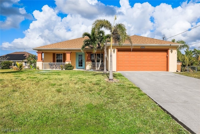 ranch-style house featuring a front yard, a porch, and a garage