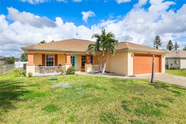 ranch-style house featuring a garage, covered porch, and a front lawn