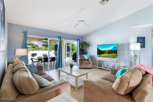 living room with light tile patterned floors, vaulted ceiling, and ceiling fan