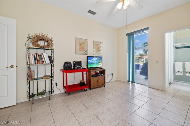 interior space featuring ceiling fan