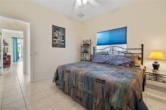 bedroom with ceiling fan and light tile patterned floors