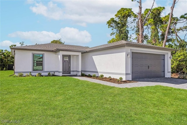 3226 NW 3rd Pl, Cape Coral, FL 33993 - view of front of house with an attached garage, a front yard, decorative driveway, and stucco siding