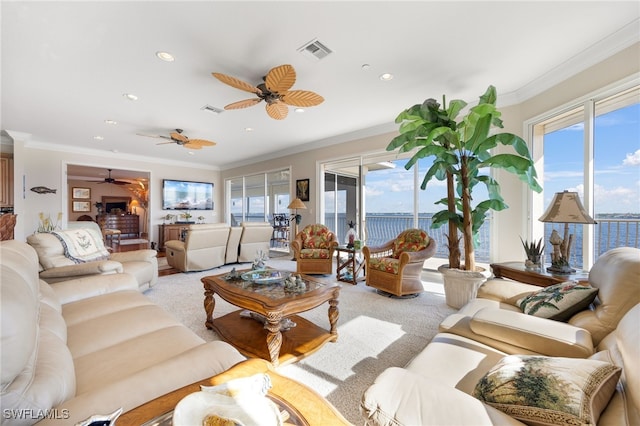 living room with carpet flooring and ornamental molding