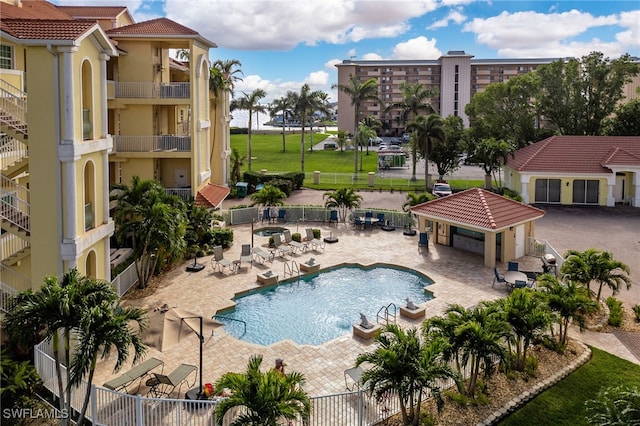 view of pool featuring a patio area