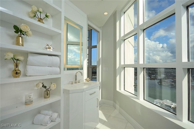 interior space with tile patterned flooring and sink