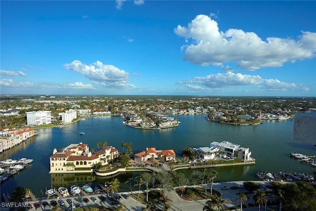 birds eye view of property featuring a water view