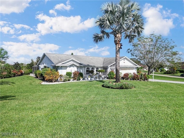 ranch-style home featuring a front yard and a garage