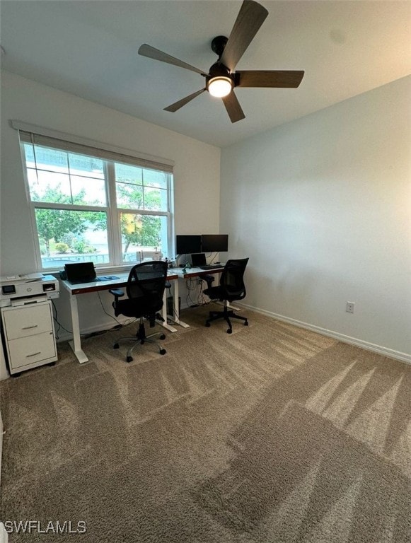 home office featuring carpet and ceiling fan