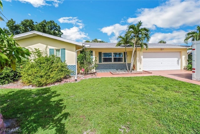 ranch-style home with a garage and a front yard