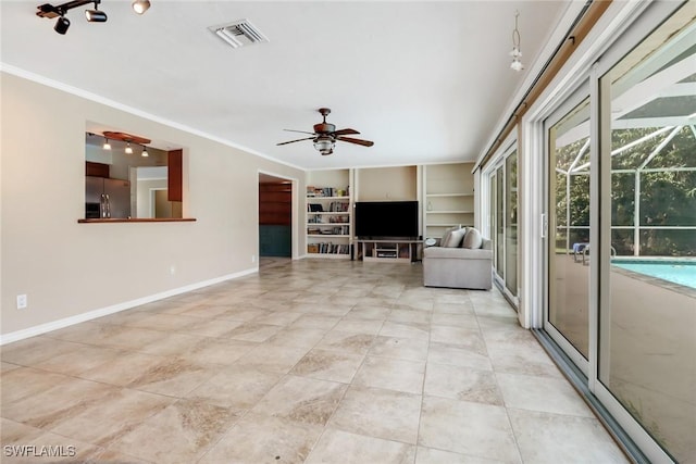 unfurnished living room with built in features, ceiling fan, and crown molding