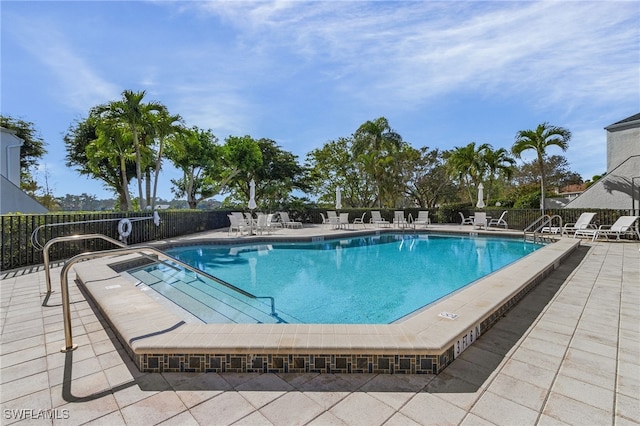 view of pool featuring a patio area