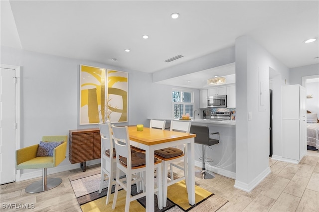 dining room with sink