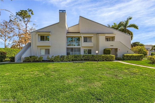 exterior space featuring a lawn