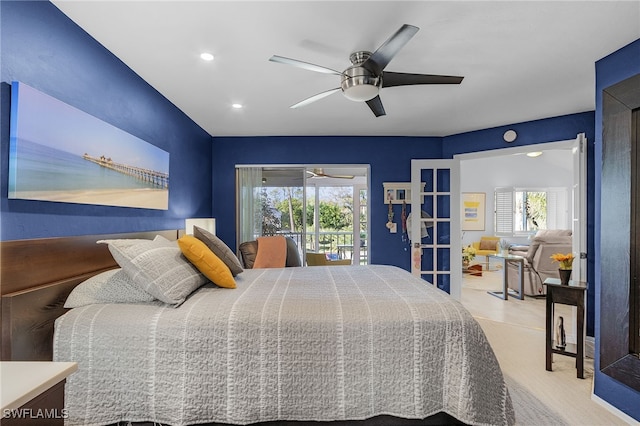 bedroom featuring ceiling fan, access to outside, and multiple windows