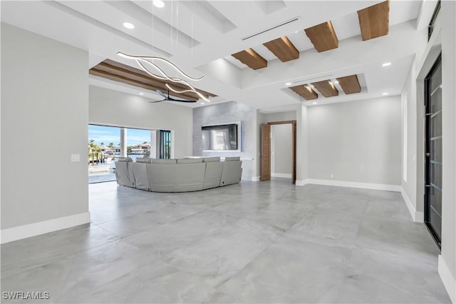 unfurnished living room featuring beam ceiling