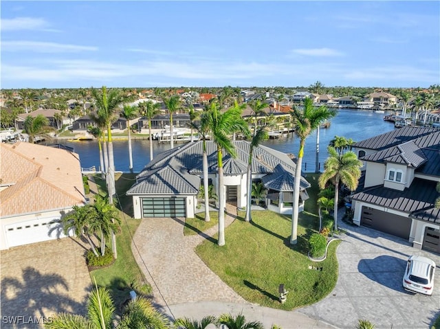 birds eye view of property featuring a water view