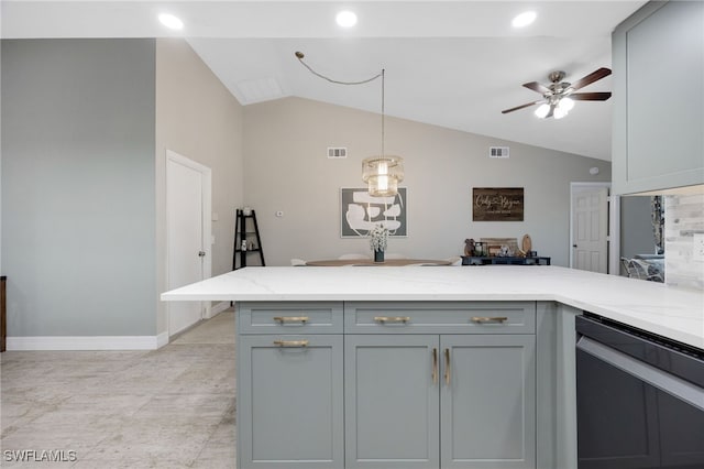 kitchen featuring gray cabinets, light stone countertops, decorative light fixtures, and lofted ceiling