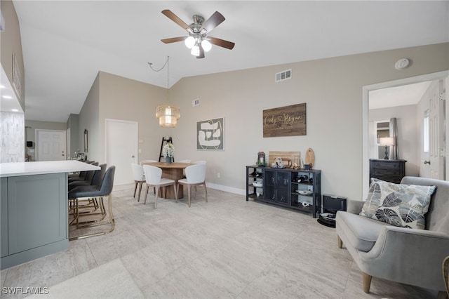 interior space featuring ceiling fan and lofted ceiling