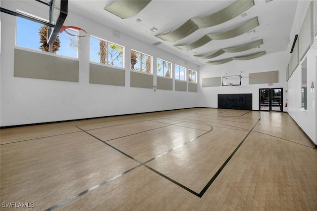 view of sport court featuring a wealth of natural light