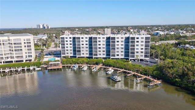 birds eye view of property featuring a water view