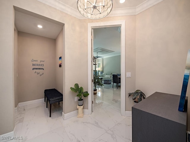 hall with a chandelier and ornamental molding