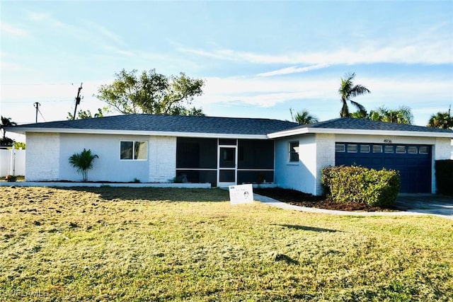 ranch-style house featuring a garage, a front lawn, and a sunroom