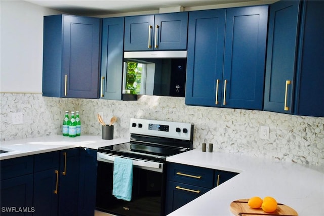 kitchen with stainless steel electric range oven, blue cabinets, and tasteful backsplash