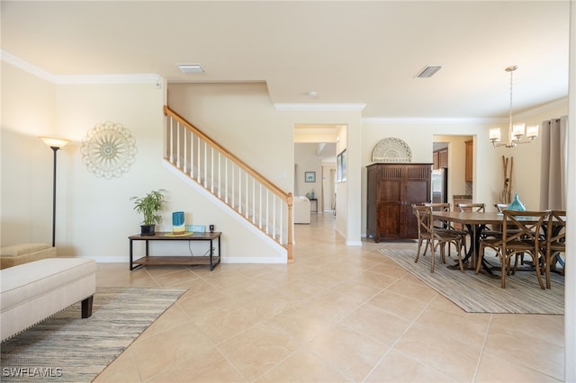 dining area featuring light tile patterned flooring, ornamental molding, and a chandelier