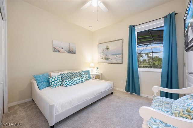 bedroom with light colored carpet and ceiling fan