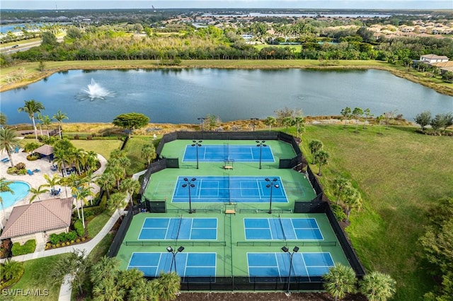 drone / aerial view with a water view