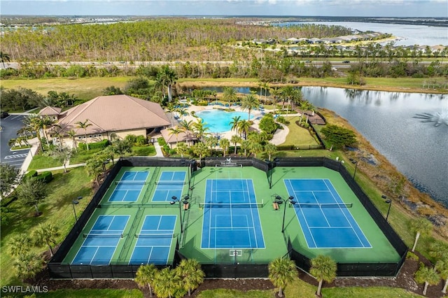 birds eye view of property featuring a water view