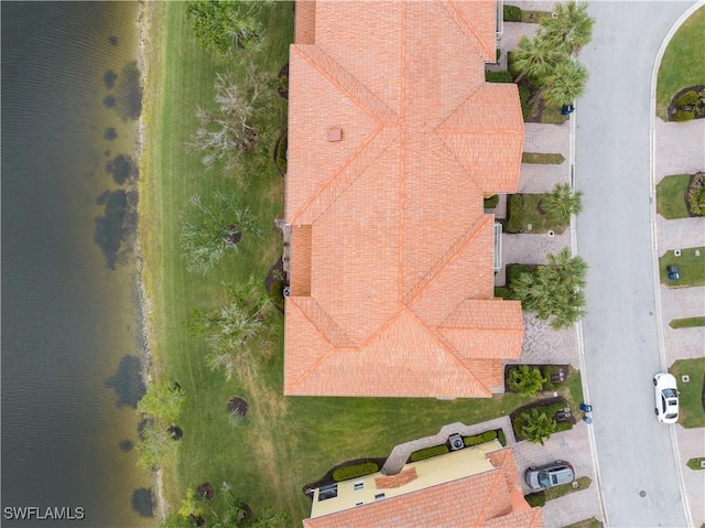 drone / aerial view featuring a water view