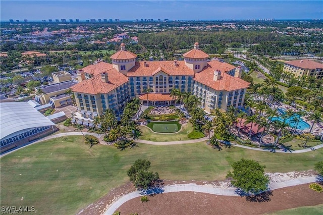 aerial view featuring a view of city and view of golf course