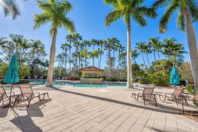 pool with a patio