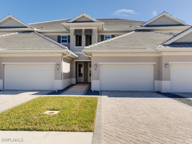 view of front of property with a garage