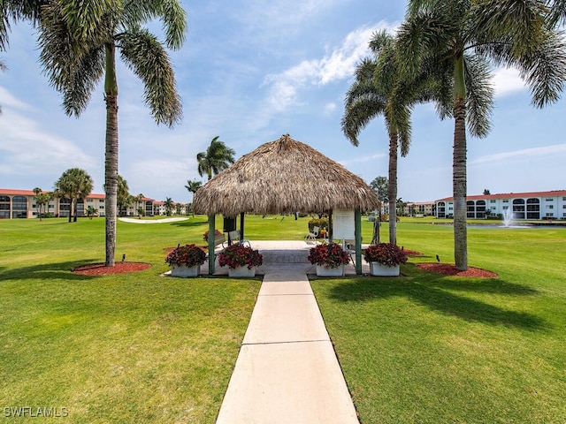 view of property's community featuring a gazebo and a yard