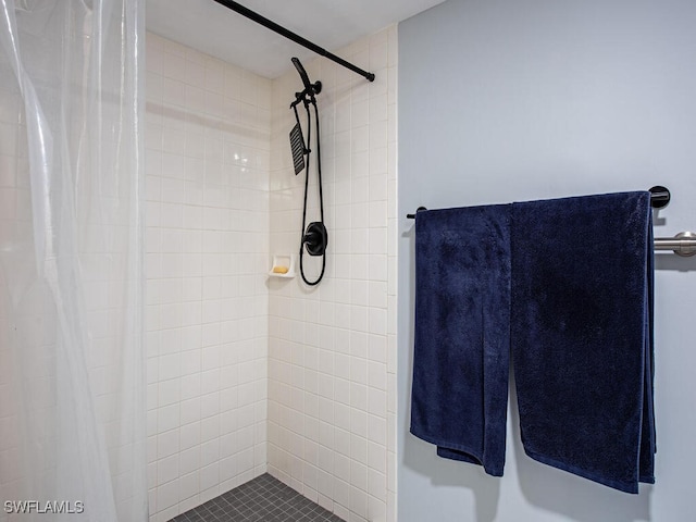 bathroom featuring a shower with curtain