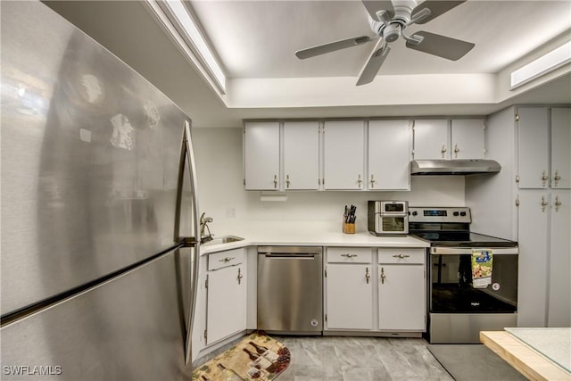 kitchen with white cabinets, ceiling fan, sink, and appliances with stainless steel finishes