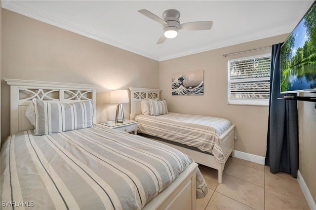 tiled bedroom featuring ceiling fan and crown molding