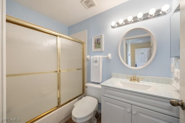 full bathroom with toilet, visible vents, combined bath / shower with glass door, and vanity