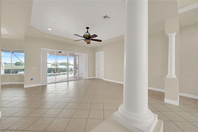 spare room featuring ceiling fan and light tile patterned floors