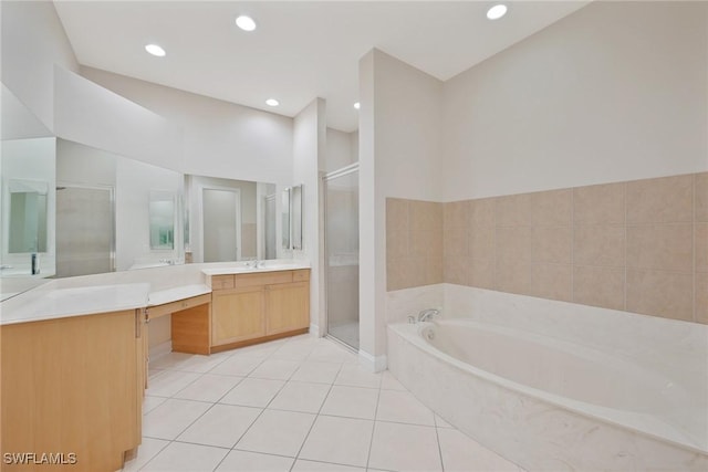 bathroom featuring vanity, tile patterned floors, and independent shower and bath