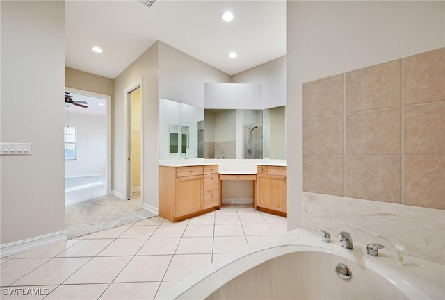 bathroom with ceiling fan, tile patterned flooring, separate shower and tub, and vanity