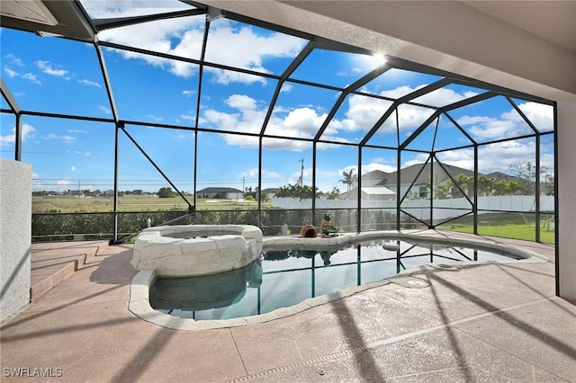 view of pool featuring a lanai and a patio