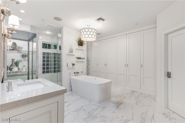 bathroom featuring shower with separate bathtub and vanity