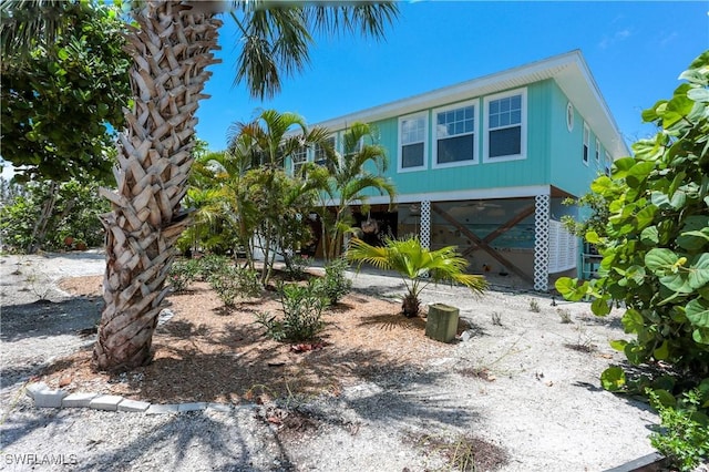 view of front of property with a carport