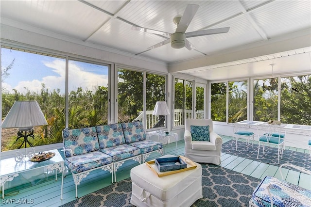 sunroom / solarium with ceiling fan