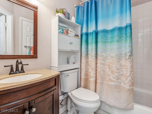 full bathroom with shower / tub combo, vanity, and toilet