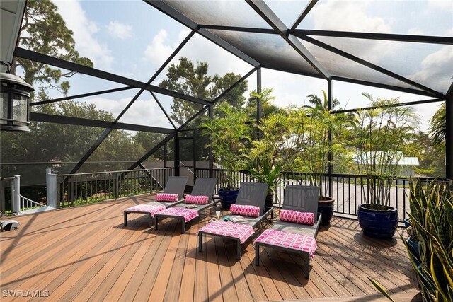 wooden deck with a lanai