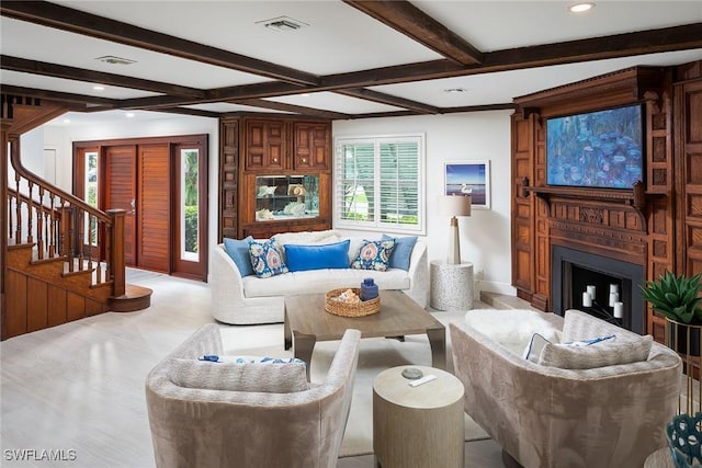 living room featuring stairway, visible vents, beam ceiling, recessed lighting, and a large fireplace